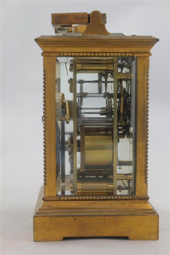 An early 20th century French gilt brass hour repeating carriage clock, 6.5in.